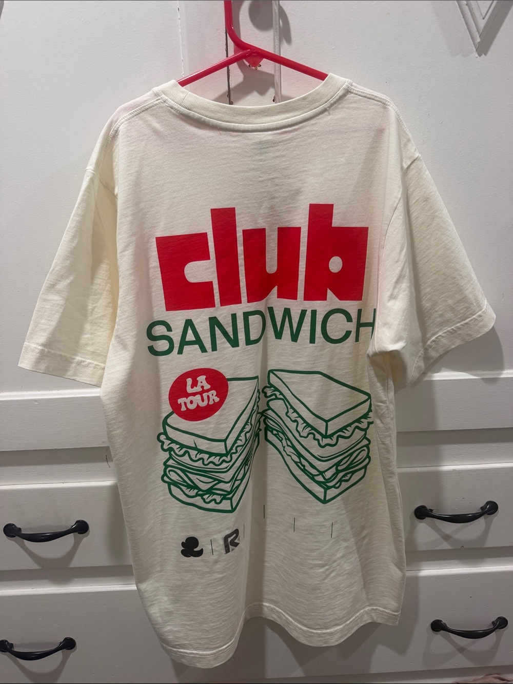 Hoka Cream Short Sleeve Tee with Red 'Club' & Green Sandwich Graphic